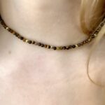 Eye of the tiger with gold beads